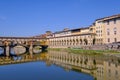 The famous Ponte Vecchio, the Old Bridge and city houses with reflections in the Arno River, Florence, Tuscany, Italy Royalty Free Stock Photo