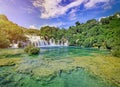 Famous, popular waterfall Skradinski Buk on natural sky and tree background. Dalmatia, Croatia. Beautiful place for tourist.