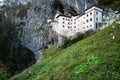 Famous Predjama castle in the mountain, build inside the rock, Slovenia