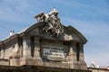 Famous Puerta de Alcala on a beautiful sunny day in Madrid City. Inscription on the pediment: Rey Carlos III year 1778