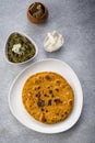 Cornmeal breads and  mustard leaves curry, famous Indian food specially prepared in winters, makki ki roti - sarson ka saag Royalty Free Stock Photo