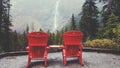 Famous Red Chairs facing Takakkaw Falls in Canada