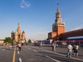 Famous Red Square with Kremlin and Saint Basil cathedral in Russia capital city Moscow with tourists