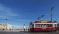 A red tram in PraÃÂ§a do ComÃÂ©rcio, lisbon, portugal Royalty Free Stock Photo