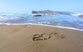 Famous resort of Crete island, Greece. Sand beach seascape with the rays of the sun. 2019 writing on the surface. Beautiful sea