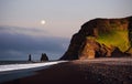 Famous Reynisdrangar rock formations at black Reynisfjara Beach. Coast of the Atlantic ocean near Vik, southern Iceland Royalty Free Stock Photo