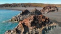 Famous Reynisdrangar rock formations at black Reynisfjara Beach. Coast of the Atlantic ocean near Vik, southern Iceland in summer Royalty Free Stock Photo