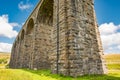 Famous Ribble Valley viaduct railway crossing showing detail of the stonework under-structure and guttering.