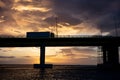 The famous Rio-Antirrio multi-suspension bridge Charilaos Trikoupis Bridge during the beautiful sunset with a truck driving on i