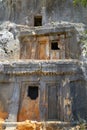 Famous rock-cut Lycian tombs in Kas resort of Antalya. Royalty Free Stock Photo