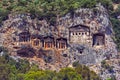 Famous rock-cut Lycian tombs of kings in carved caves in the cliffs of ancient Caunos Kaunos town, a UNESCO world heritage site