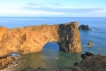 Famous Rock arch at Dyrholaey coast, South Iceland. Royalty Free Stock Photo