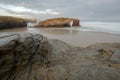 The famous rocky arch visible at low tide on As Catedrais beach