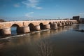 The Famous Roman Bridge Puente Romano of Cordoba Spain and River Guadalquivir Rio Grande Royalty Free Stock Photo