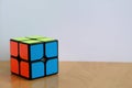 Rubik's Small 2x2 Pocket Cube on a Table Royalty Free Stock Photo