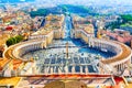 Famous Saint Peter`s Square in Vatican and aerial view of the Rome city during sunny day Royalty Free Stock Photo