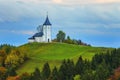 Cloudy ska over Saint Primoz church in Jamnik Slovenia
