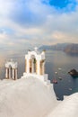 Famous Santorini, Greece. Conceptual composition of the famous architecture of the island of Santorini. White arches of bells and