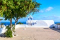 Famous Santorini iconic view. Holy trinity Agia Triada church in Oia village, Santorini island, Greece