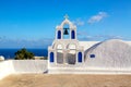 Famous Santorini iconic view. Holy trinity Agia Triada church in Oia village, Santorini island, Greece