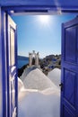 Santorini view with churches against blue sky in Oia village, Greece Royalty Free Stock Photo