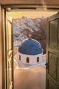 Santorini view with traditional church against colorful sunset in Thira town, Greece Royalty Free Stock Photo