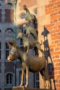 Famous sculpture of Bremen musicians on sunny day. Bronze monument of fairytale animals. Heritage of Grimm brothers. Royalty Free Stock Photo