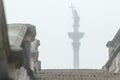 Famous Sigismund's Column silhouette in fog view from stone stairs in Polish Warsaw