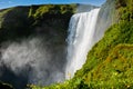 Famous Skogafoss Waterfall, Iceland, view from neighboring hill