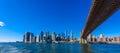 Famous Skyline of downtown New York City, Brooklin Bridge and Manhattan with skyscrapers illuminated over East River panorama. New Royalty Free Stock Photo