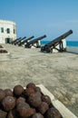 Famous slave trading fort of colonial times Cape Coast Castle with old cannons and white washed walls, Ghana, Africa