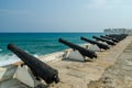 Famous slave trading fort of colonial times Cape Coast Castle with old cannons and white washed walls, Ghana, Africa