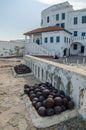 Famous slave trading fort of colonial times Cape Coast Castle with old cannons and white washed walls, Ghana, Africa