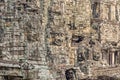 Smiling stone faces of the Bayon temple in Angkor Thom in Cambodia Royalty Free Stock Photo