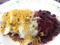 Famous south indian breakfast food semolina fry with mixture and beetroot and combination makes an healthy food and served in a