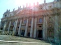 St. Peter square and church in Vatican city in a sunny day. Rome, Italy. Royalty Free Stock Photo