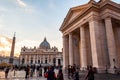 The famous St. Peter`s Square, Piazza San Pietro full of people with obelisk. Large plaza located directly in front of St. Peter Royalty Free Stock Photo