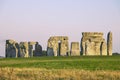 Stonehenge, famous landmark, standing stones of Stonehenge in Wiltshire, England. Sunlight, Clear sky, green grass, no people. Royalty Free Stock Photo