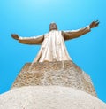 Statue of Jesus Christ with open handed on top of the Church of the Sacred Heart on Tibidabo in Barcelona, Spain Royalty Free Stock Photo