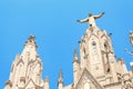 Statue of Jesus Christ with open handed on top of the Church of the Sacred Heart on Tibidabo in Barcelona, Spain Royalty Free Stock Photo