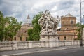 Famous Statue of the Ponte Vittorio Emanuele II and St. Peter`s basilica dome - Rome, Italy Royalty Free Stock Photo