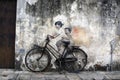 Famous street art and graffiti paintings of Children On A Bicycle along Armenian Street, Penang, Malaysia