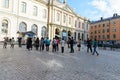 Famous Swedish Academy and Nobel Museum in Stockholm city with crowd of tourists taking pictures