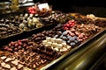 Famous sweet candy market .Confectionery at Boqueria market place in Barcelona, Spain. Assorted chocolate candy shop. Royalty Free Stock Photo