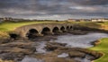 The famous Swilken (or Swilcan) Bridge over Swilken Burn between the first and Royalty Free Stock Photo