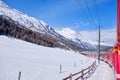 The famous Swiss mountain train of Bernina Express crossed italian and swiss Alps