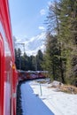 The famous Swiss mountain train of Bernina Express crossed italian and swiss Alps