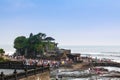 Famous Tanah Lot Temple in Bali Island Indonesia with many people.