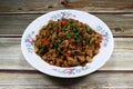 Spicy fried and stirred minced pork with holy basil and chilly. Royalty Free Stock Photo