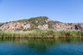 Famous tombs carved inside rocks in ancient Kaunos city, Turkey. Lycian Royal mountain tombs carved into the rocks near the town o Royalty Free Stock Photo